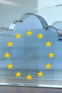 AI-generated image - A glass cloud with the European stars on a wooden table
